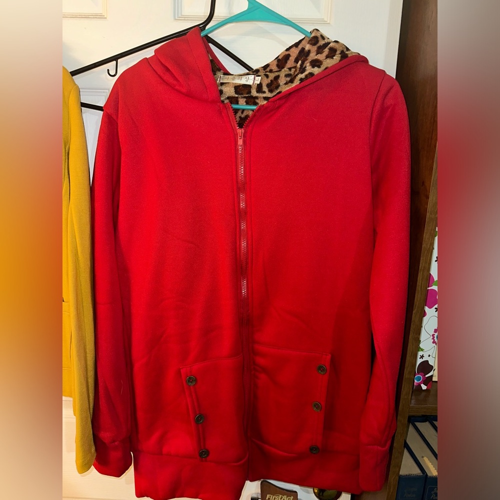 Large, bright red with leopard print lining.